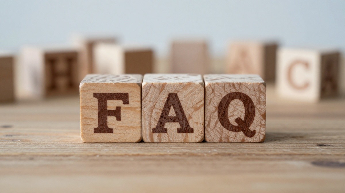 Wooden letter blocks spelling FAQ